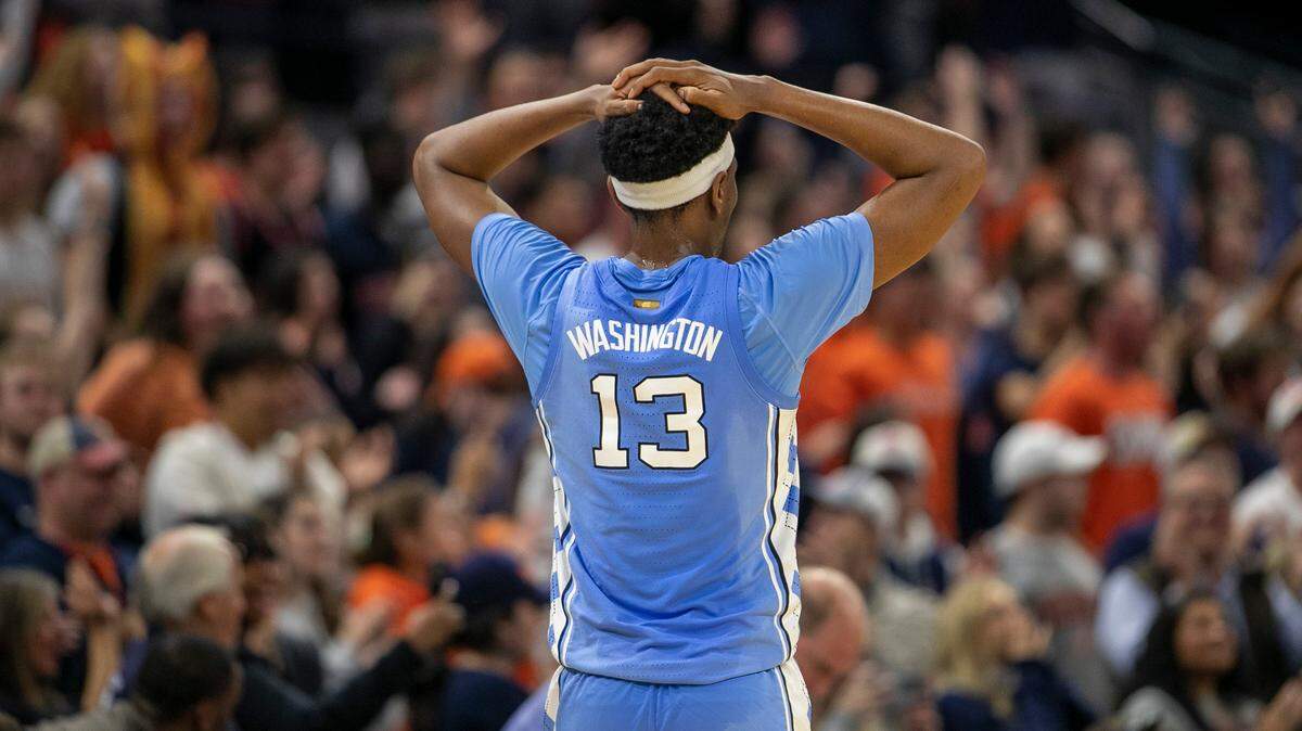 North Carolina’s Jalen Washington (13) reacts as Virginia secures their 65-58 victory over the Tar Heels on Tuesday, January 10, 2023 at John Paul Jones Arena in Charlottesville, Va.