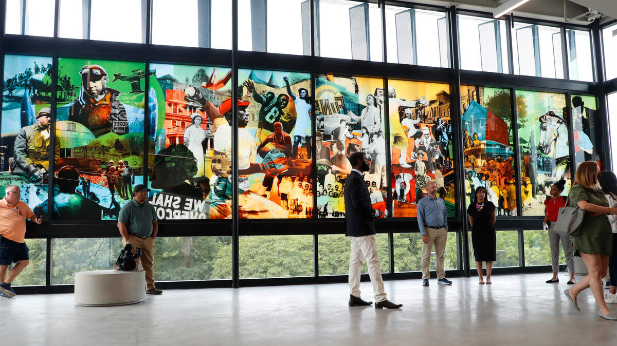 A glass collage welcomes visitors to the second floor of the new community center at John Chavis Memorial Park in Raleigh, N.C., seen Wednesday, June 2, 2021.  Juneteenth: A Chavis Juneteenth Celebration will be held at the park on Friday, June 19.