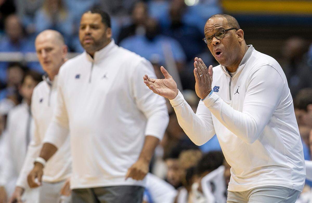 North Carolina coach Hubert Davis applauds his team’s performance in the first half against James Madison on Sunday, November 20, 2022 at the Smith Center in Chapel Hill, N.C.