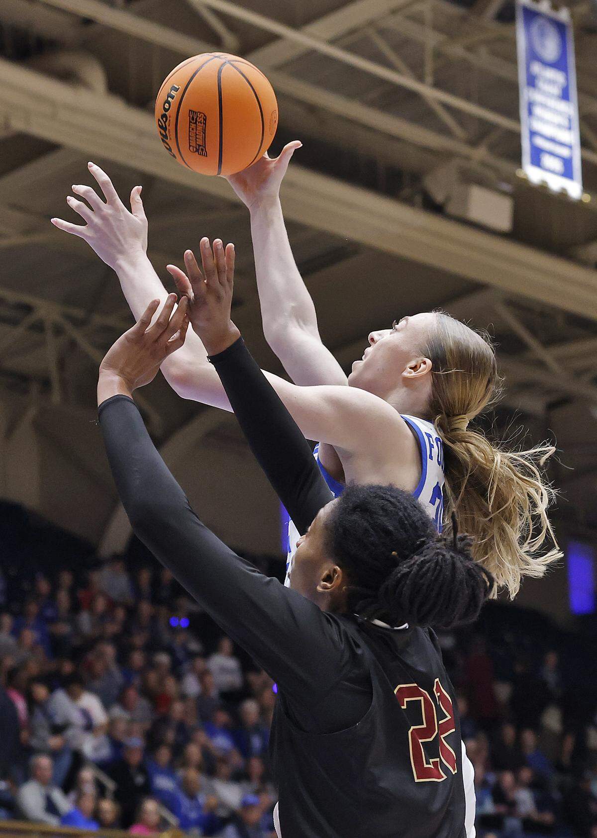 Duke’s Toby Fournier shoots over College of Charleston’s Grace Ezebilo during the first half of the Blue Devils’ 81-64 first-round NCAA Tournament win on Friday, March 20, 2026, at Cameron Indoor Stadium in Durham, N.C.