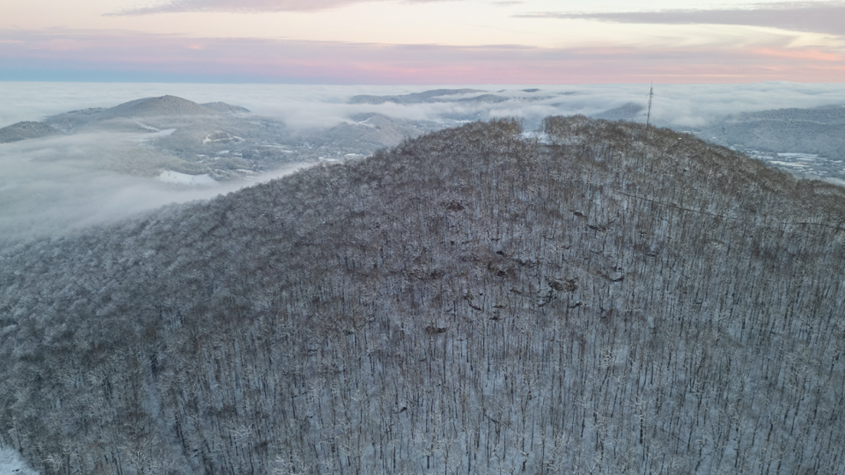 The Blue Ridge Conservancy has bought 74 acres at Howard Knob, overlooking Boone. The group has long worked to protect the site, with its unusual gneiss boulder field, from development. It plans to open the property in 2026 to climbers and hikers.