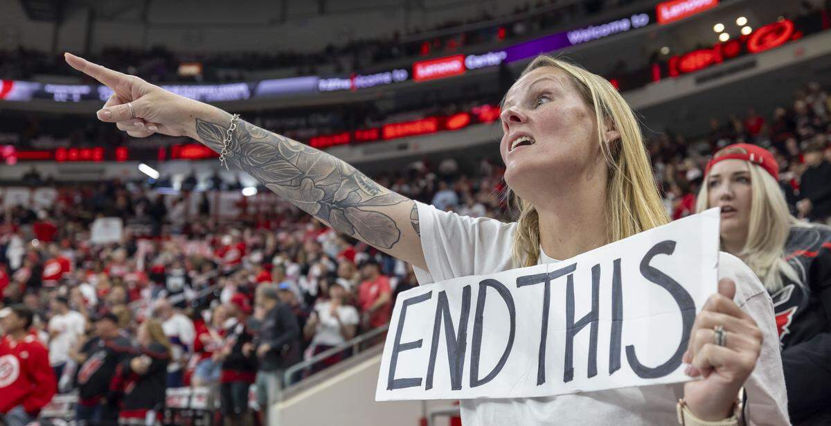 Ami Parrish of Lillington, N.C. sends her message to the Carolina Hurricanes as they warm up for Game 5 of the Eastern Conference Finals against Montreal on Friday, May 29, 2026 at Lenovo Center in Raleigh, N.C.