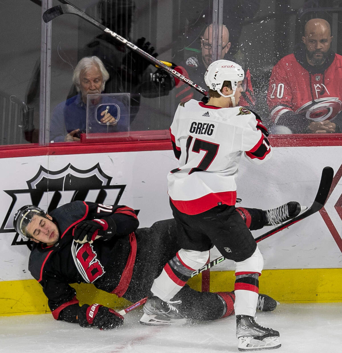 Ottawa’s Ridly Greig (17) checks Carolina Hurricanes’ Brady Skjei (76) during the second period on Tuesday, April 4, 2023 at PNC Arena in Raleigh, N.C.