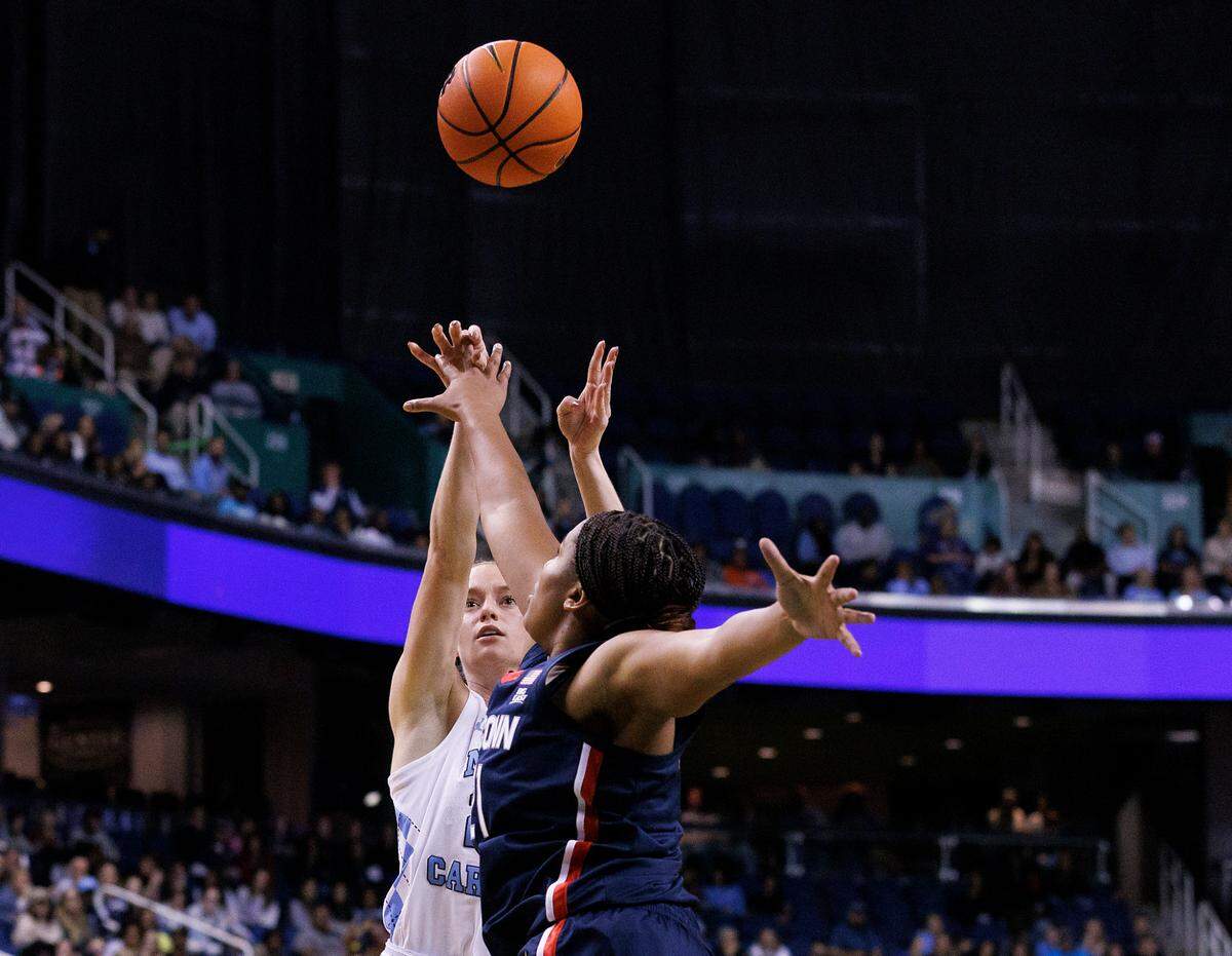 North Carolina’s Lexi Donarski shoots over UConn’s Sarah Strong during the second half of the Tar Heels’ 69-58 loss on Friday, Nov. 15, 2024, at First Horizon Coliseum in Greensboro, N.C.