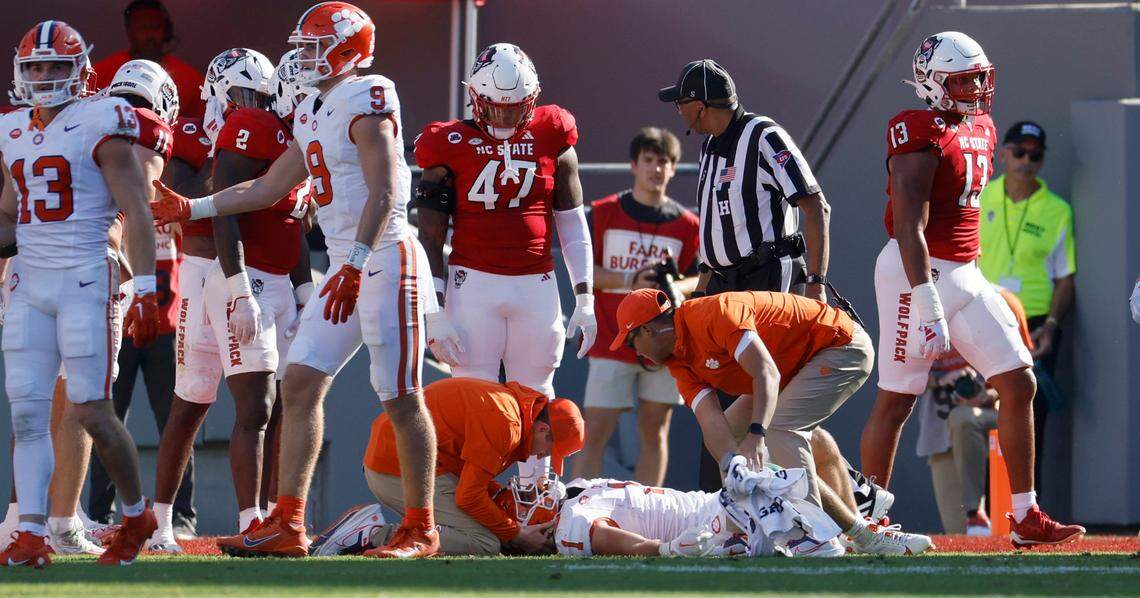 Trainers check on Clemson running back Will Shipley (1) after he was injured during the first half of N.C. State’s game against Clemson at Carter-Finley Stadium in Raleigh, N.C., Saturday, Oct. 28, 2023.