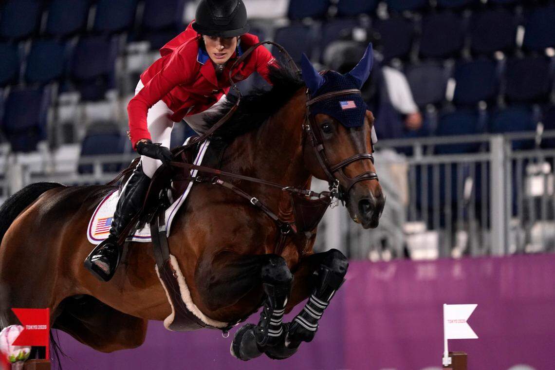 United States’ Jessica Springsteen, riding Don Juan van de Donkhoeve, competes in a jump-off during the equestrian jumping team final at Equestrian Park in Tokyo at the 2020 Summer Olympics, Saturday, Aug. 7, 2021, in Tokyo, Japan. (AP Photo/Carolyn Kaster)