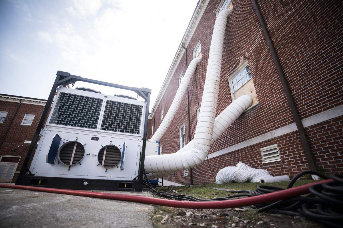 Industrial strength de-humidifying equipment removes moisture from Dobo Hall on UNC Wilmington’s campus.