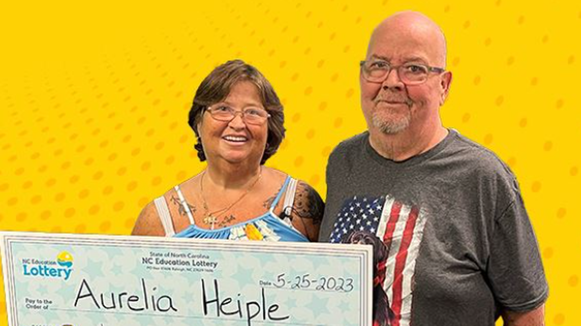 Aurelia Heiple, pictured with her brother Rusty Deeming, spent $1 on the jackpot-winning ticket.