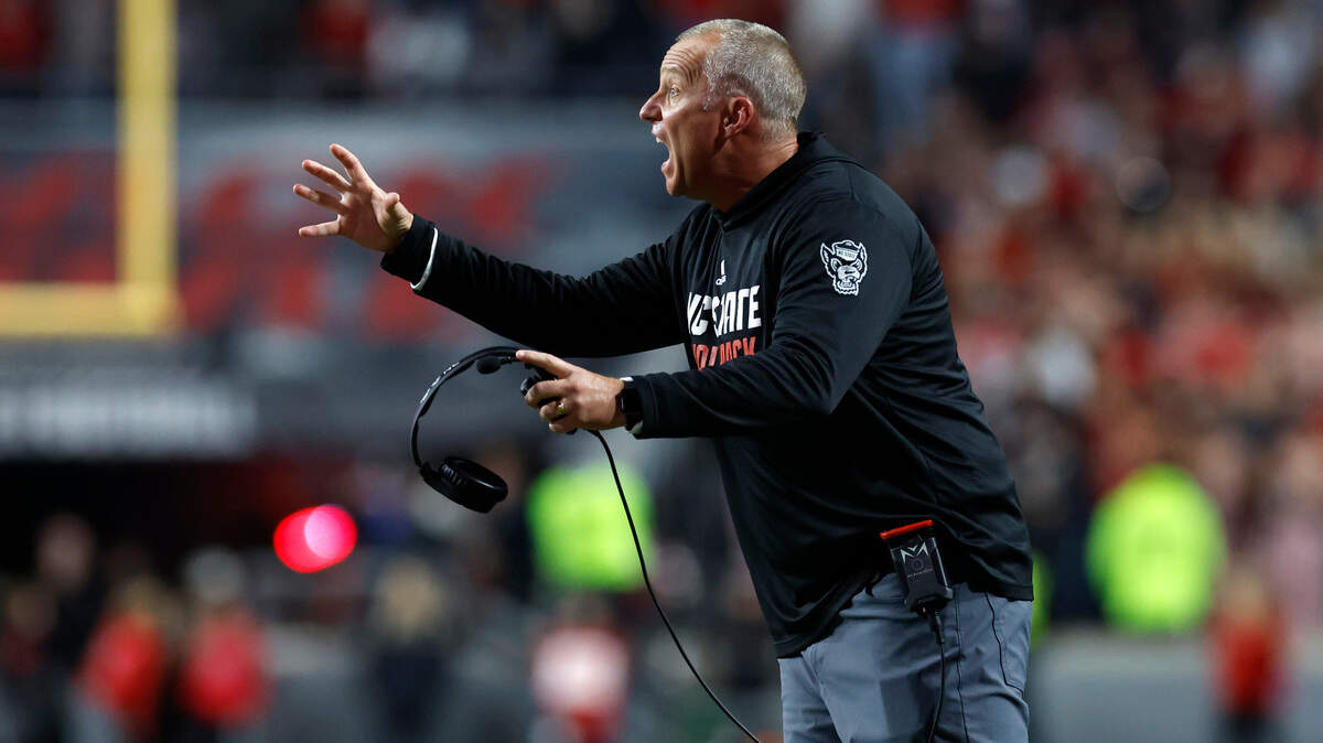 N.C. State head coach Dave Doeren yells to his players during the second half of N.C. State’s 20-6 victory over Miami at Carter-Finley Stadium in Raleigh, N.C., Saturday, Nov. 4, 2023.