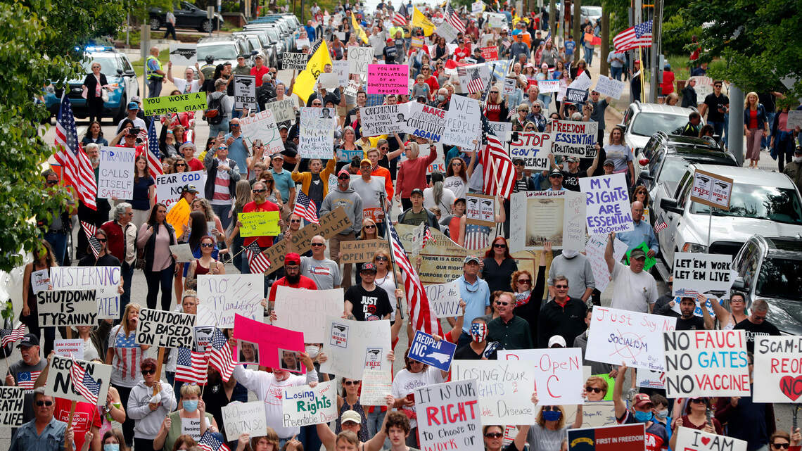 Protesters who want NC to reopen converge on Raleigh. Expert urges caution in lifting rules.