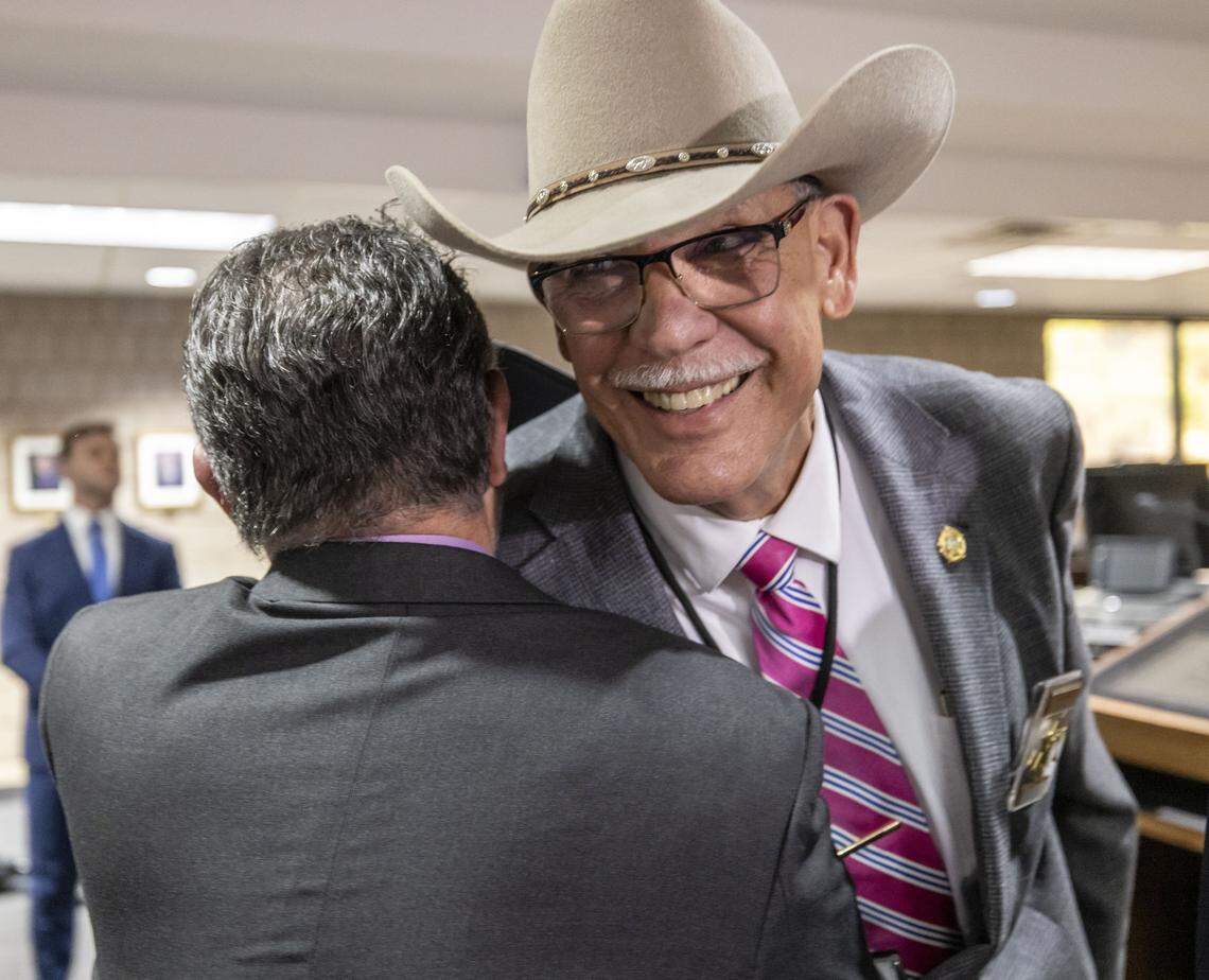 N.C. Senate candidate and Rockingham County Sheriff Sam Page embraces Doug Isley after provisional ballots in Rockingham County were counted, giving Page a bigger lead over Senate President Pro Tempore Phil Berger on Friday, March 6, 2026 in Reidsville, N.C.