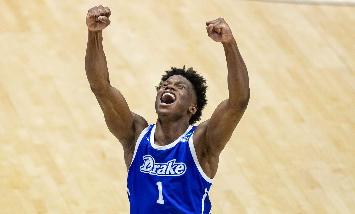 Drake’s Joseph&nbsp;Yesufu celebrates late in the second half of a First Four game against Wichita State in the NCAA men’s college basketball tournament Thursday, March 18, 2021, at Mackey Arena in West Lafayette, Ind. Drake won 53-52. (AP Photo/Robert Franklin)