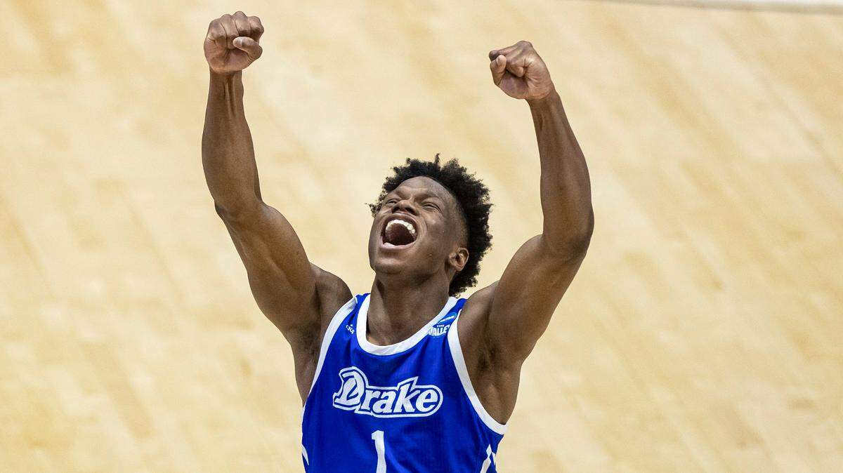 Drake’s Joseph Yesufu celebrates late in the second half of a First Four game against Wichita State in the NCAA men’s college basketball tournament Thursday, March 18, 2021, at Mackey Arena in West Lafayette, Ind. Drake won 53-52. (AP Photo/Robert Franklin)