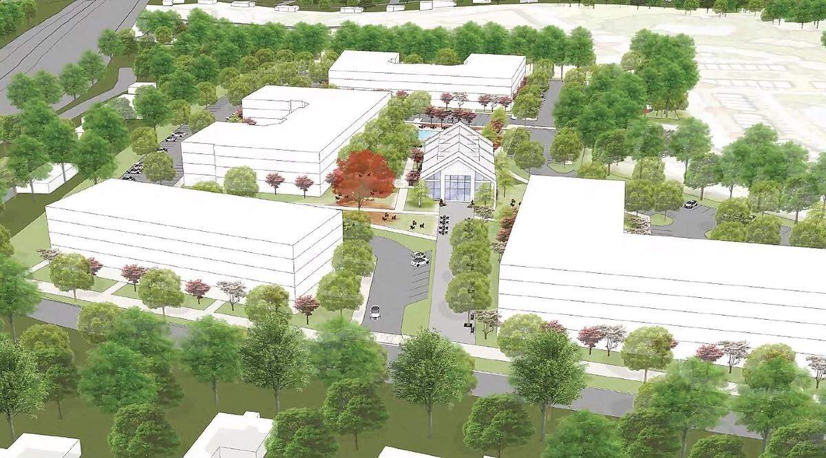 Four apartment buildings surrounding a clubhouse are shown in this architect’s drawing of the proposed Barbee Chapel apartment complex on Barbee Chapel Road in eastern Chapel Hill.