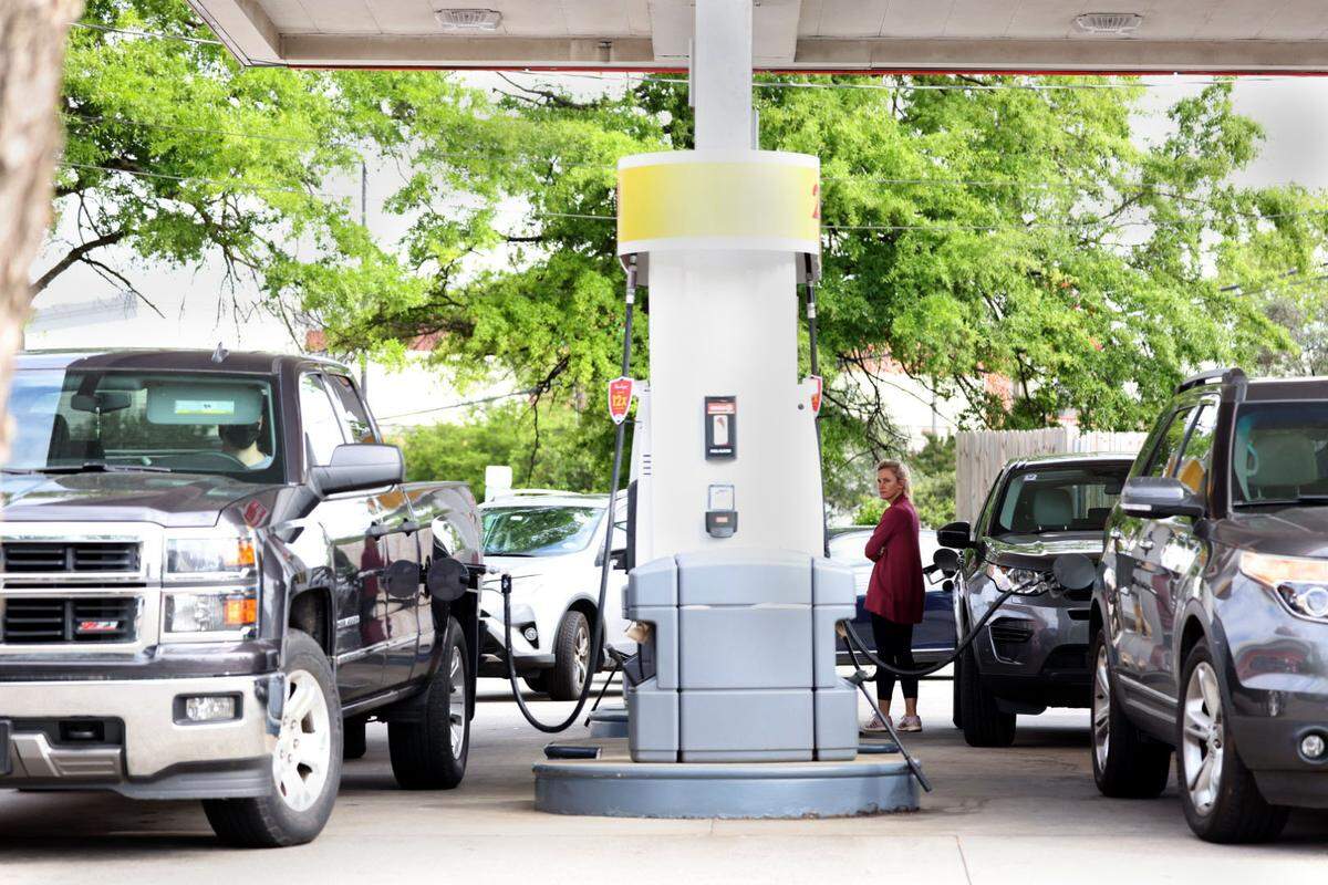 Cars line up at Circle K at the corner of Sharon Amity and Randolph Road in Charlotte, N.C., to fill up gas on Tuesday, May 11, 2021.
