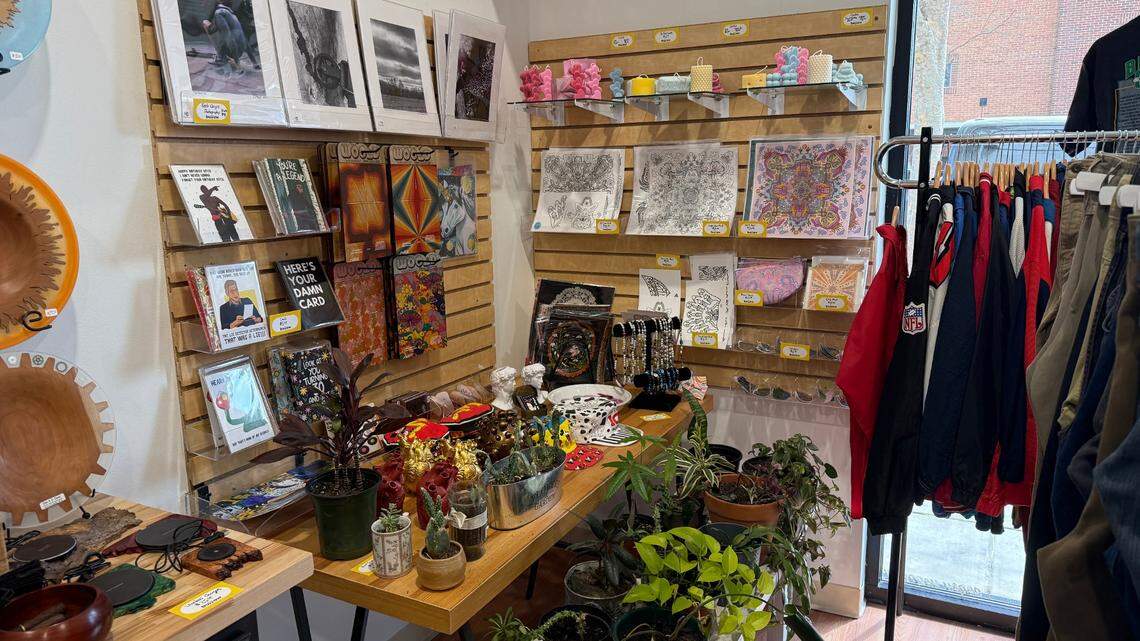 Artwork, whimsical candles and live plants are for sale in one corner of The Burrow.