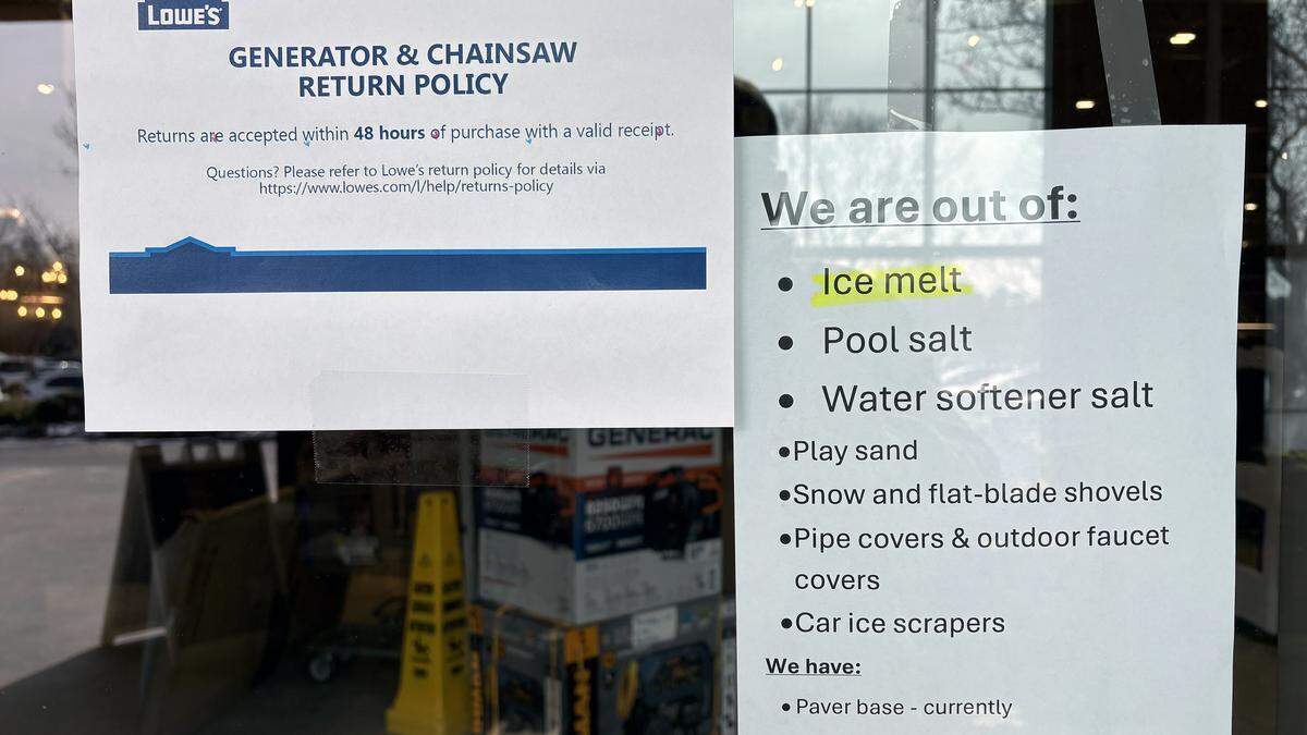 Signs posted on the door of the Lowe’s in Chapel Hill advise customers that they are out of many winter weather products, and that generators have a limited return policy.