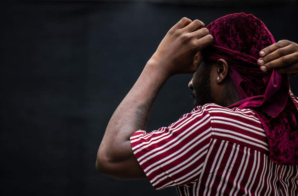 Djawaun Diggs fixes his durag during Durag Fest 2021 in Charlotte, on Saturday, June 19, 2021.