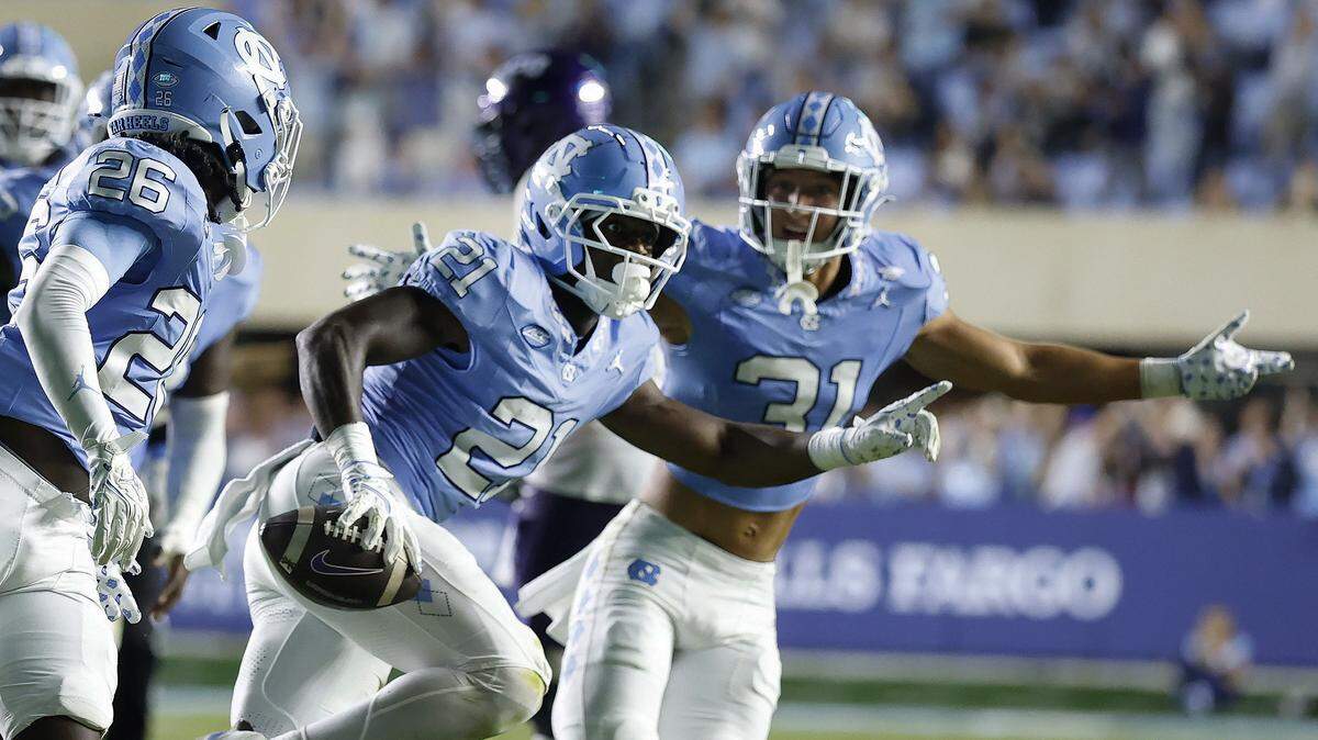 North Carolina defensive back Kaleb Cost (21) celebrates intercepting the ball during the first half of UNC’s game against TCU at Kenan Stadium in Chapel Hill, N.C., Monday, Sept. 1, 2025.