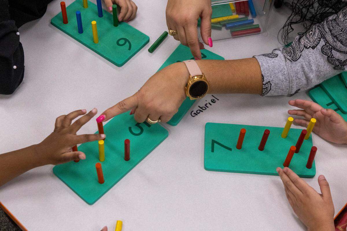 Pre-schoolers practice counting at the Early Learning Center at Memory Road, Thursday, Nov. 30, 2023. The Center is Wake County’s first standalone Pre-K center with space for up to 132 students.
