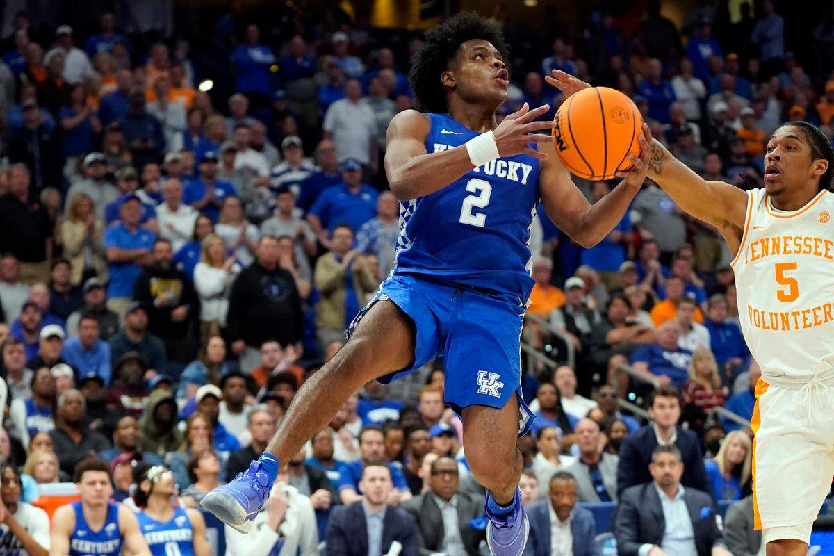 Kentucky guard Sahvir Wheeler (2) goes up against Tennessee guard Zakai Zeigler (5) during the second half of an NCAA college basketball game in the semifinal round at the Southeastern Conference tournament, Saturday, March 12, 2022, in Tampa, Fla.