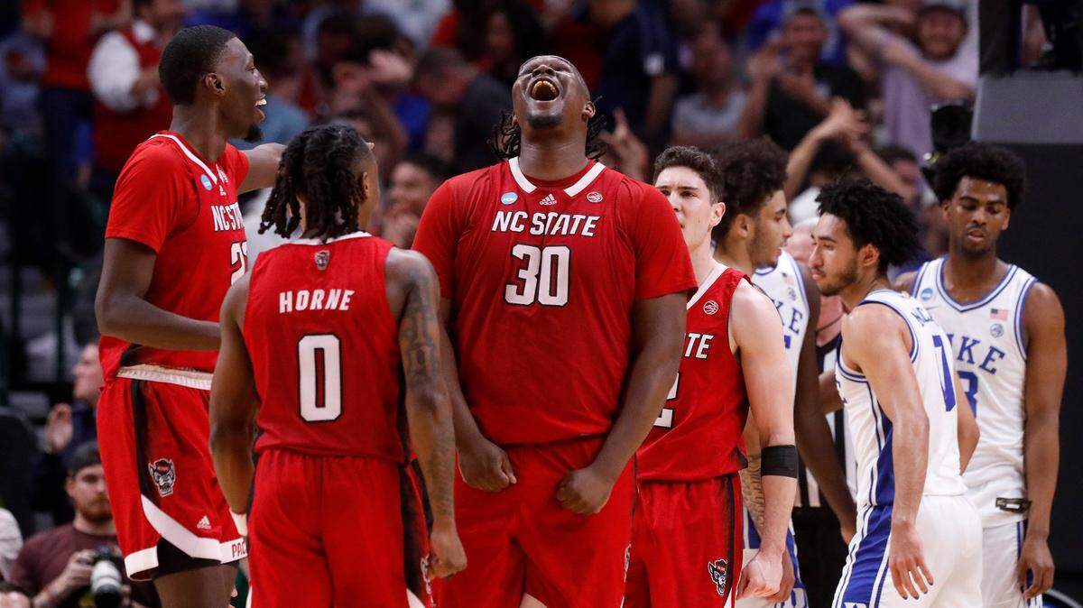 N.C. State’s DJ Burns Jr. reacts following an and-one in the second half of the Wolfpack’s 76-64 win over Duke in the NCAA Tournament Elite Eight on Sunday, March 31, 2024, at American Airlines Center in Dallas, Texas.