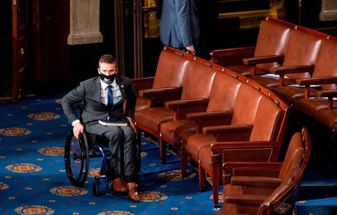 Rep. Madison Cawthorn (R-NC) arrives on the House floor in the Capitol in Washington, D.C., before being sworn in on January 3, 2021.