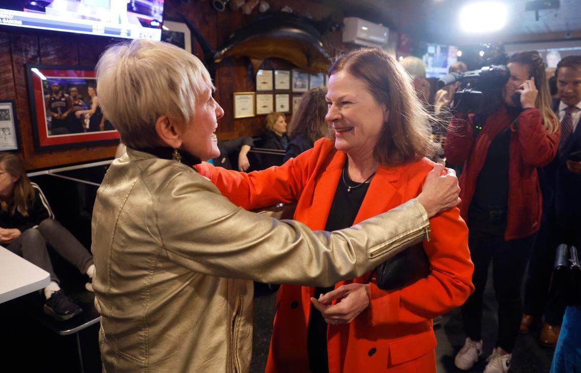 Raleigh Mayor Mary-Ann Baldwin greets supporter Linda Shields at an election night party at the Players Retreat in Raleigh, N.C., Tuesday, Nov. 8, 2022.