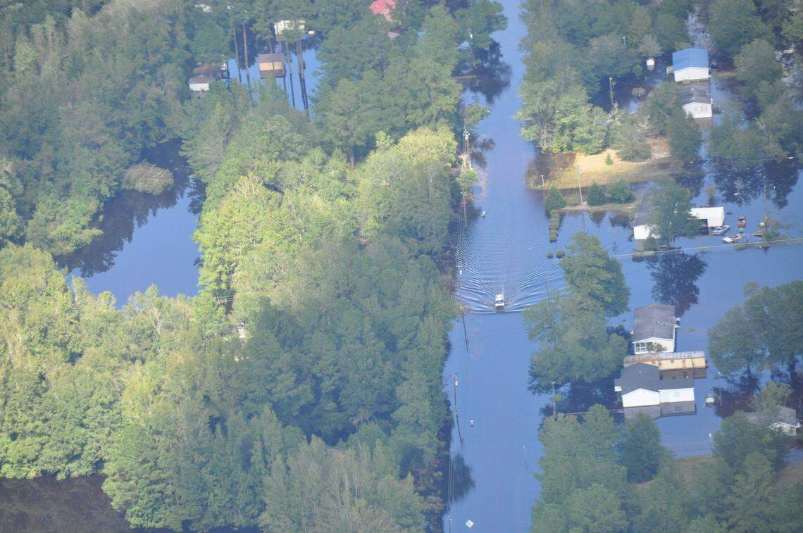 An aerial photo taken near Nichols on Sept. 18 shows roads completely covered by water.