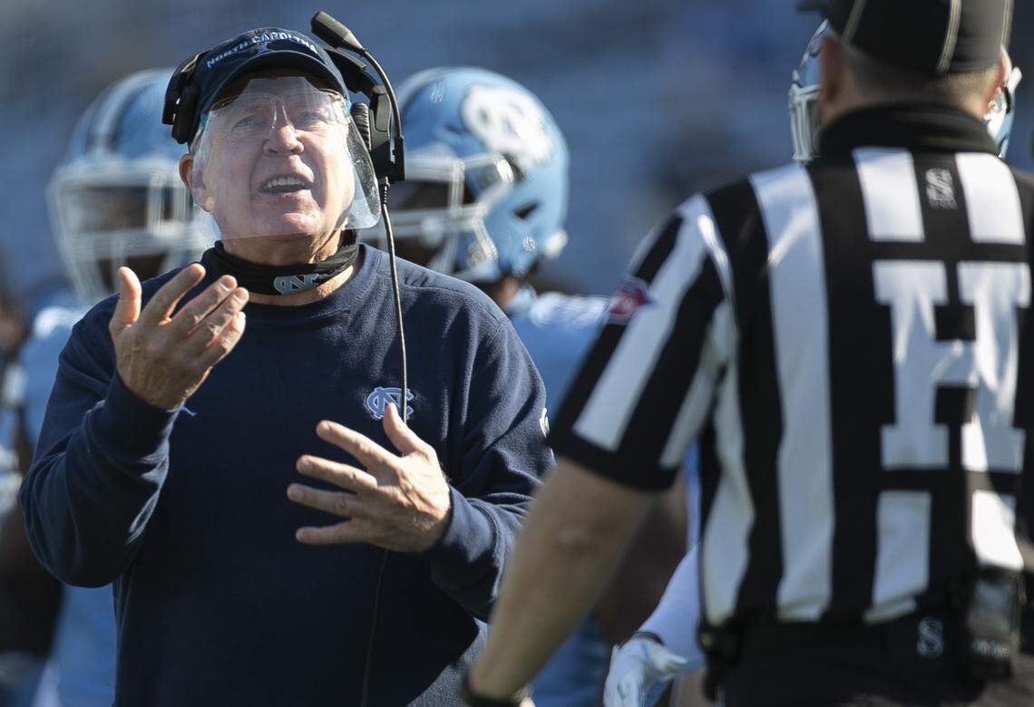 North Carolina coach Mack Brown argues with the official after an interception by Wake Forest defense back Ja’Sir Taylor (6) in the second quarter at Kenan Stadium on Saturday, November 14, 2020 in Chapel Hill, N.C.