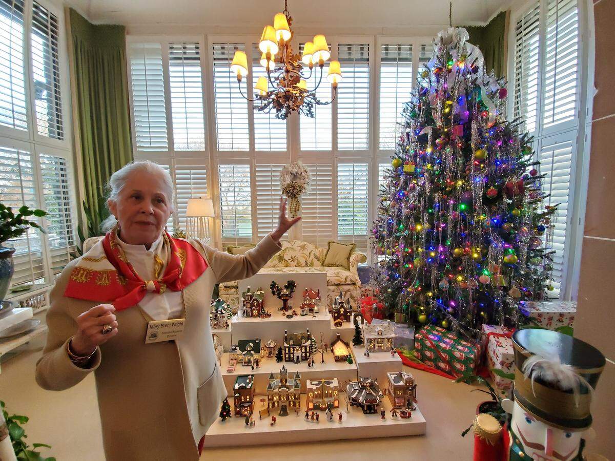 North Carolina Executive Mansion docent Mary Brent Wright tells visitors about one of the governor’s Christmas trees during the mansion’s December 2019 open house. The 2020 open house is canceled due to coronavirus concerns, but exterior decorations will be on display.