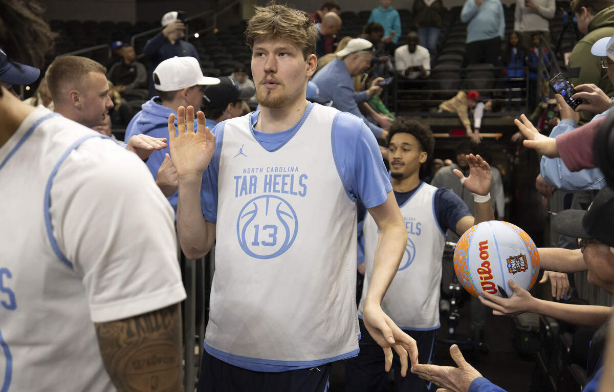 North Carolina center Henri Veesaar (13) enters the court for the Tar Heels’ practice on Wednesday, March 18, 2026, at Bon Secours Arena in Greenville, S.C.