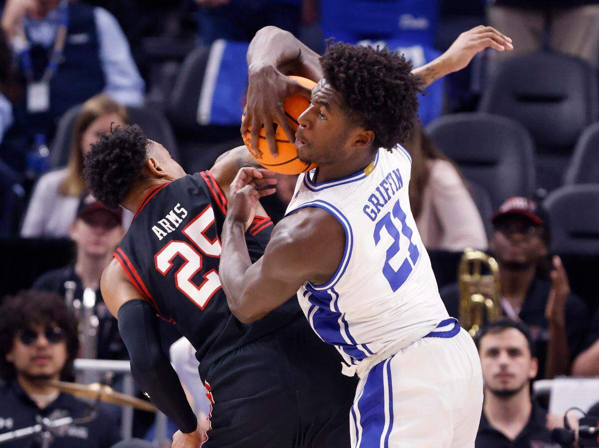 Duke’s AJ Griffin (21) pulls in the rebound from Texas Tech’s Adonis Arms (25) during the second half of Duke’s 78-73 victory over Texas Tech in the Sweet 16 round of the NCAA Tournament at the Chase Center in San Francisco, Calif., Thursday, March 24, 2022.