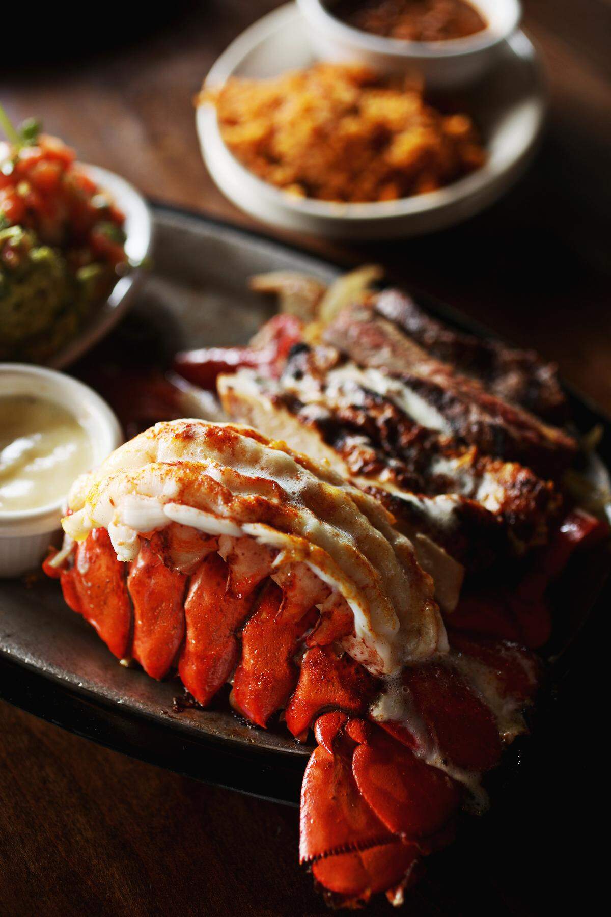 Uncle JulioÕs house specialty Lobster y Fajitas combo is served only on Friday, Saturday and Sunday. The combo parries adroitly with a broiled lobster tail, served alongside succulent chicken and skirt steak fajitas.