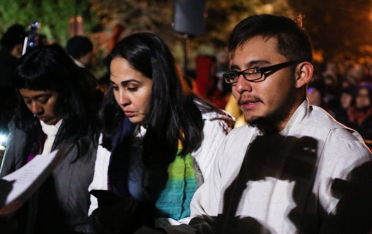Daniel Oliver-Perez stands in a group of supporters before the vigil being held for his father, Samuel Oliver-Bruno, on Tuesday, Nov. 27, 2018. Oliver-Bruno was arrested by ICE agents in Morrisville on Friday, Nov. 23 after leaving CityWell United Methodist Church in Durham where he was in sanctuary to attend a biometrics appointment requested by USCIS.