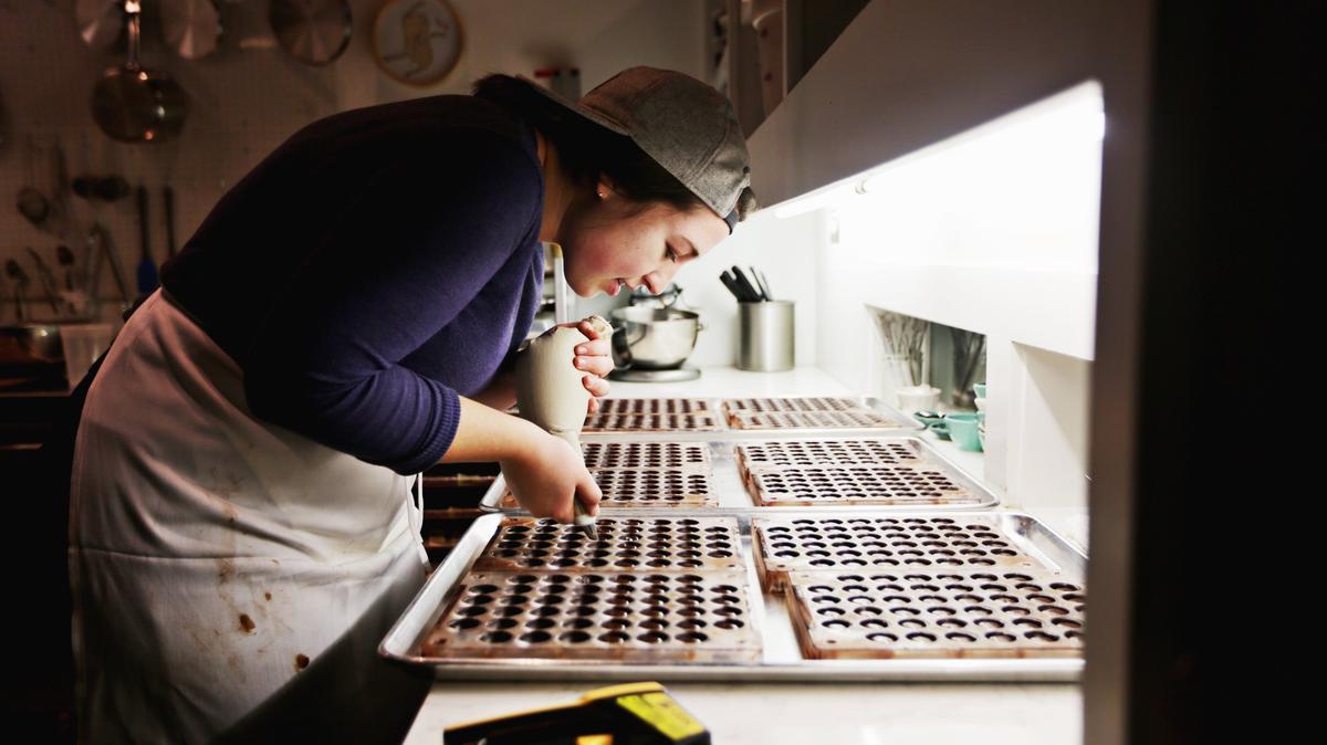 Videri Chocolate Factory confectioner Mary Kate Kornegay works on a batch of rosemary honey caramels on Friday morning, Oct. 26, 2018, in downtown Raleigh.