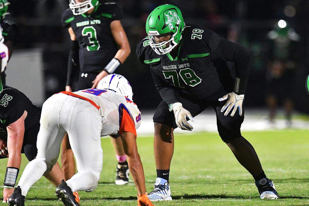 Cary’s Trey Blue (78) faces Athens Drive’s Luke Rutheny (0) on the line of scrimmage in the first half. The Cary Imps and the Athens Drive Jaguars met in a football game in Cary, N.C. on September 6, 2024. Athens Drive wins 28-13.