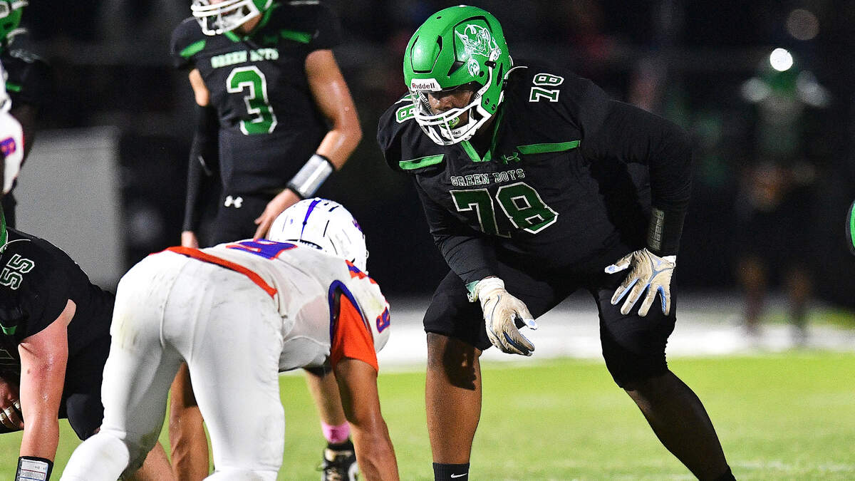 Cary’s Trey Blue (78) faces Athens Drive’s Luke Rutheny (0) on the line of scrimmage in the first half. The Cary Imps and the Athens Drive Jaguars met in a football game in Cary, N.C. on September 6, 2024. Athens Drive wins 28-13.