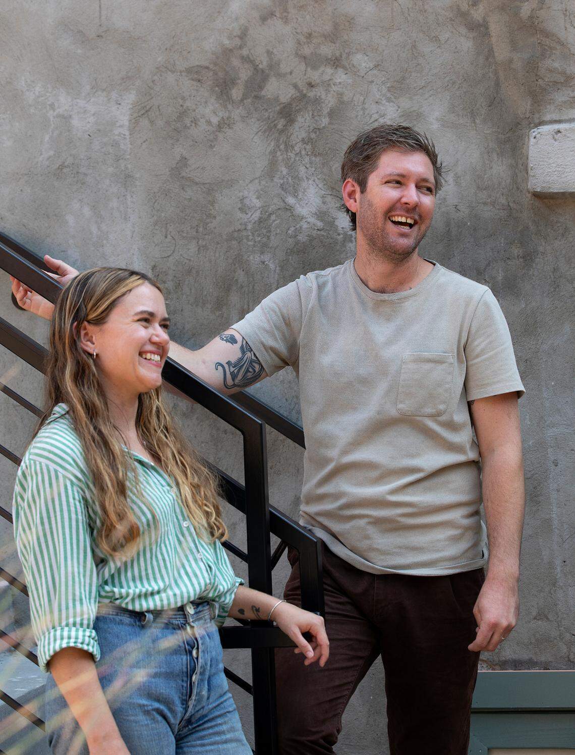 Co-owners Jordan Owens and Matt Northrup are photographed on the outdoor patio of their new restaurant, Redstart Takeaway, on Wednesday, Aug. 28, 2024, in Durham, N.C.