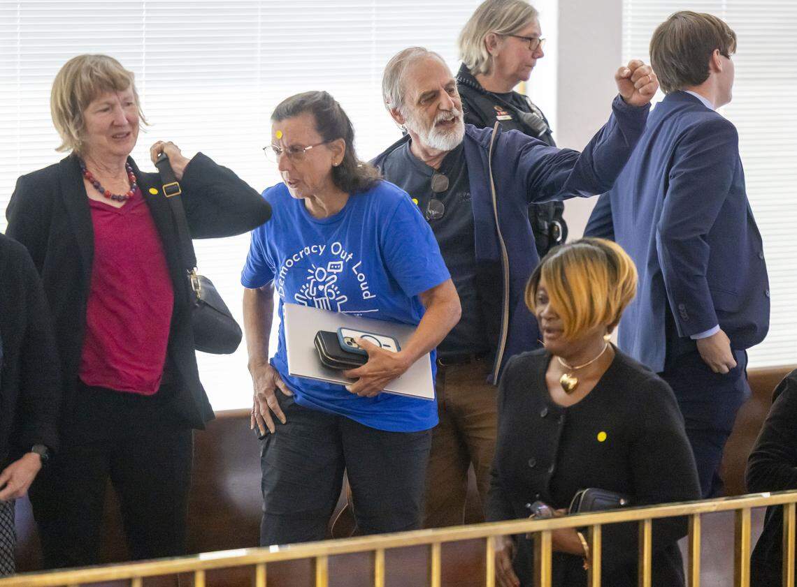 Demonstrators chant as they are removed from the gallery of the N.C. House as they loudly denounce Senate Bill 249, a bill to realign the North Carolina Congressional districts, on Wednesday, October 22, 2025 at the General Assembly in Raleigh, N.C. 
