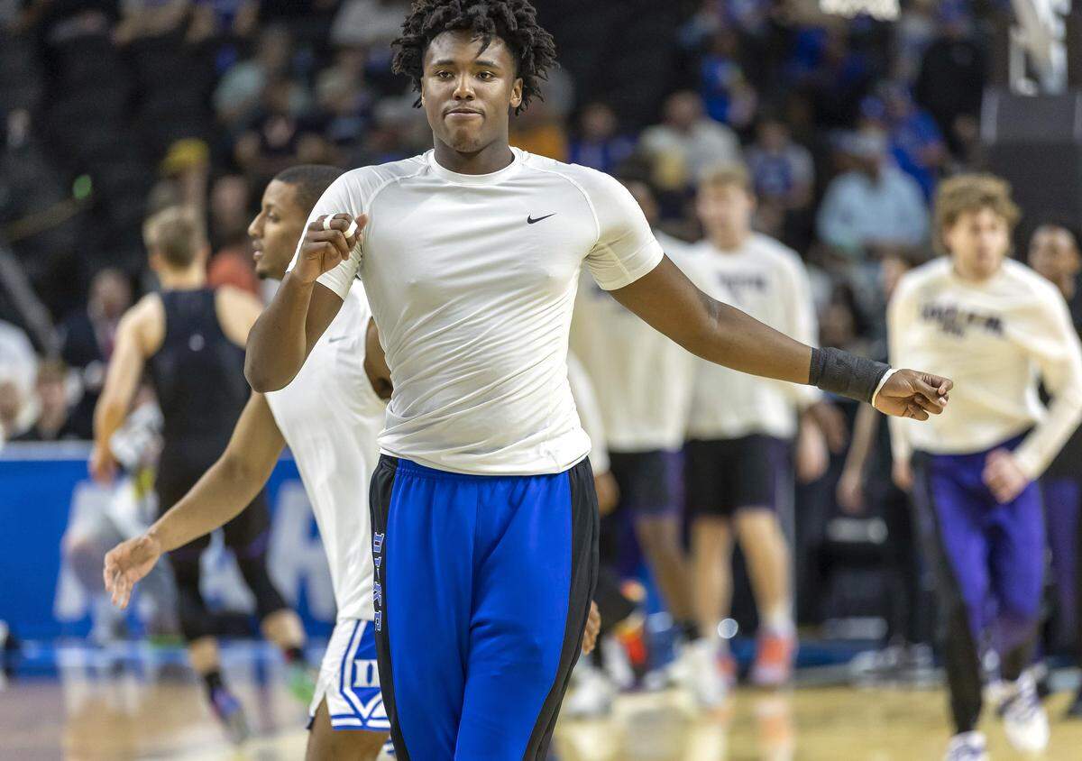 Duke center Patrick Ngongba II (21) warms up for the Blue Devils’ game against TCU on Saturday, March 21, 2026, at Bon Secours Arena in Greenville, S.C.