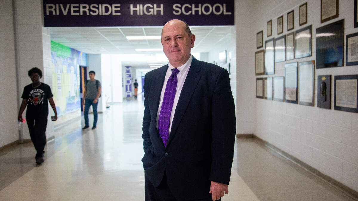 Readers voted Tim Velegol, the engineering program director at Riverside High School in Durham, as the Triangle Education Superhero.
