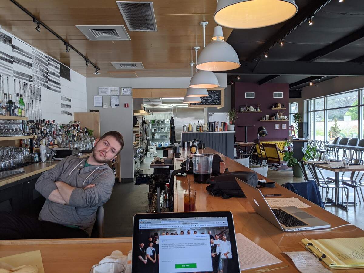 Christopher Lopez, chef of Postmaster restaurant in Cary, NC, took this photo of Patrick, the restaurant’s bar manager at 10 a.m. on March 17, 2020. “So far this is all today has looked like —&nbsp; sitting around and planning as much as we can. It feels as if we are in limbo when it comes to making arrangements for our staff.”