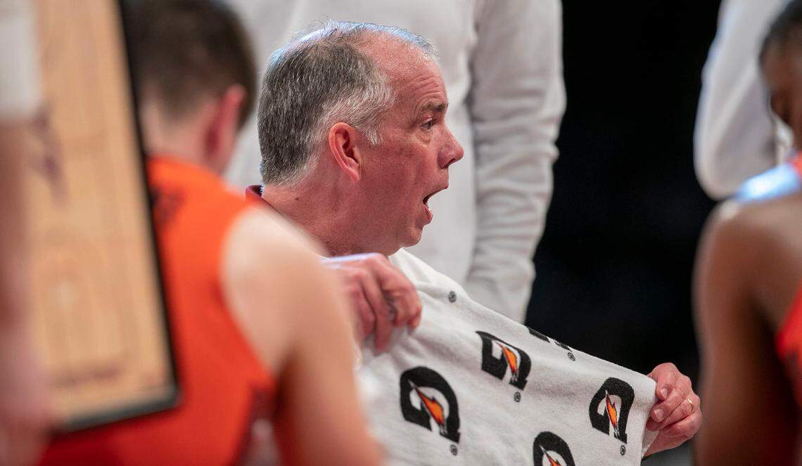 Virginia Tech coach Mike Young huddles with his team during their semi-final game of the ACC Tournament against North Carolina on Friday, March 11, 2022 at Barclays Center in Brooklyn, N.Y.