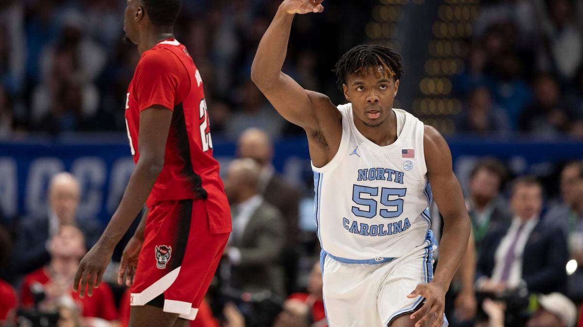 North Carolina’s Harrison Ingram (55) reacts after a three point basket in the first half against N.C. State during the ACC Men’s Basketball Tournament Championship at Capitol One Arena on Saturday, March 16, 2024 in Washington, D.C.