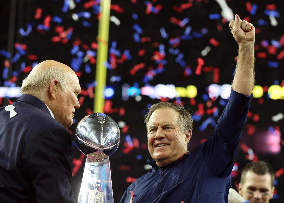 New England Patriots head coach Bill Belichick celebrates with the Vince Lombardi Trophy after beating the Atlanta Falcons during Super Bowl LI at NRG Stadium in 2017.