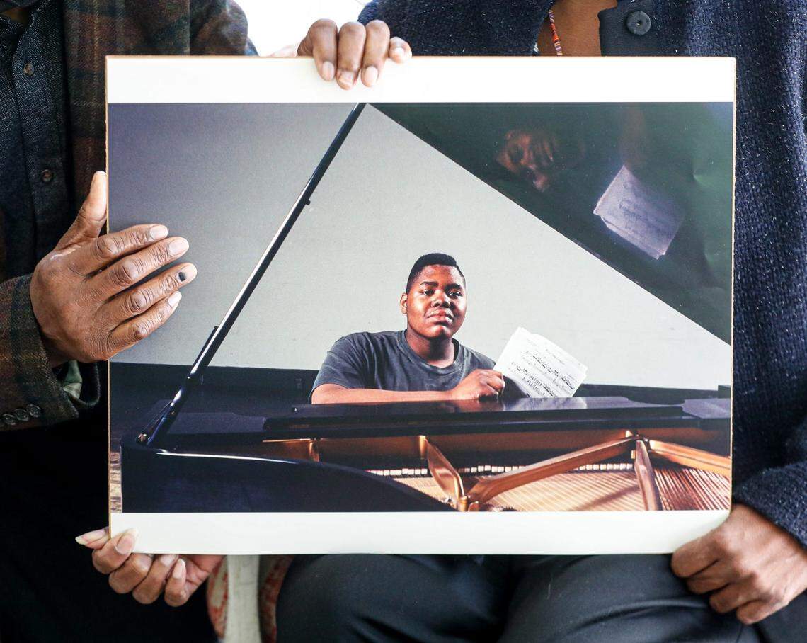 The parents of Herman Whitfield III, Gladys Whitfield and Herman Whitfield Jr., hold a portrait of their son, who was described by many as a genius musician and composer. Whitfield III, 39, died at his parent’s home in 2022. Two IMPD officers, Adam Ahmad and Steven Sanchez, facedcharges of reckless homicide, involuntary manslaughter, battery, battery resulting in moderate bodily injury and battery resulting in severe bodily injury, in regards to the incident in which Whitfield III died.