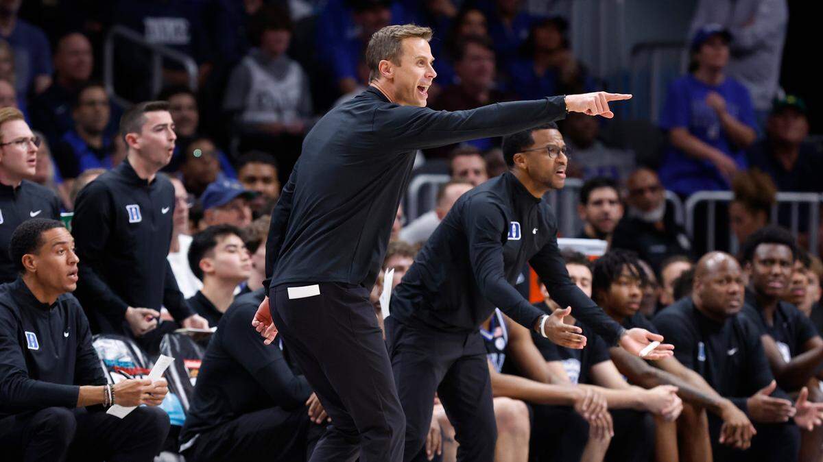 Duke head coach Jon Scheyer yells to the officials during the first half of Duke’s game against Kentucky in the State Farm Champions Classic in Atlanta, Ga., Tuesday, Nov. 12, 2024.