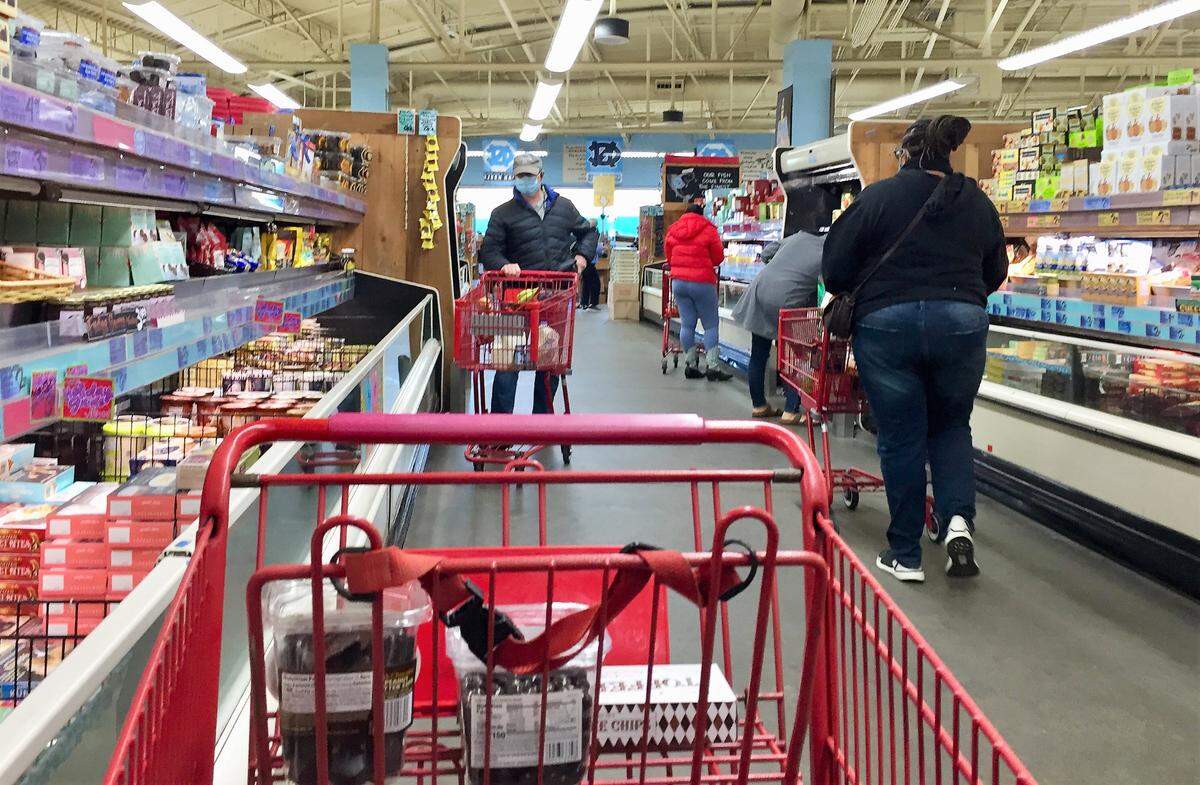 Shoppers inside Trader Joes in Chapel Hill.