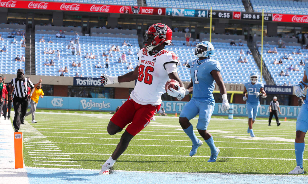 N.C. State wide receiver Emeka Emezie (86) reacts after scoring on a 42-yard touchdown reception during the first half of N.C. State’s game against UNC at Kenan Stadium in Chapel Hill, N.C., Saturday, Oct. 24, 2020.